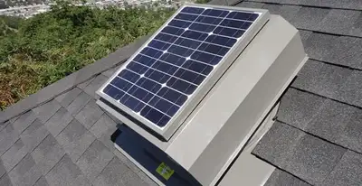 attic fan installation services with energy-efficient roof-mounted ventilation system in Fresno, CA