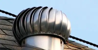 attic fan installation services with professionally installed roof ventilation unit in Fresno, CA
