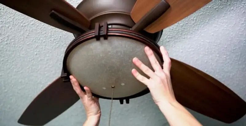 Ceiling fan repair and reinstallation on ceiling mount in Fresno, CA