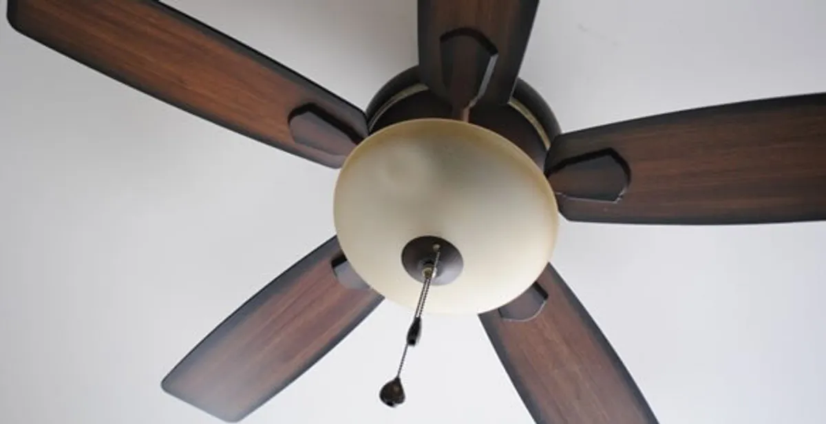 Fully installed ceiling fan with balanced blades and light fixture in Fresno, CA