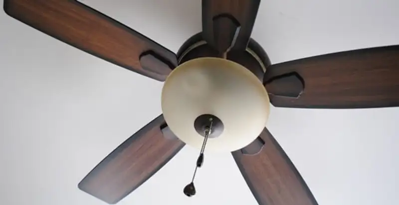 Fully installed ceiling fan with balanced blades and light fixture in Fresno, CA