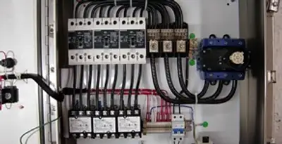 Electrical panel installation with organized circuit breakers and wiring in Fresno, CA
