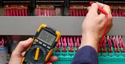 electrical service showing professional testing and troubleshooting of electrical panel by licensed electricians in Fresno, CA