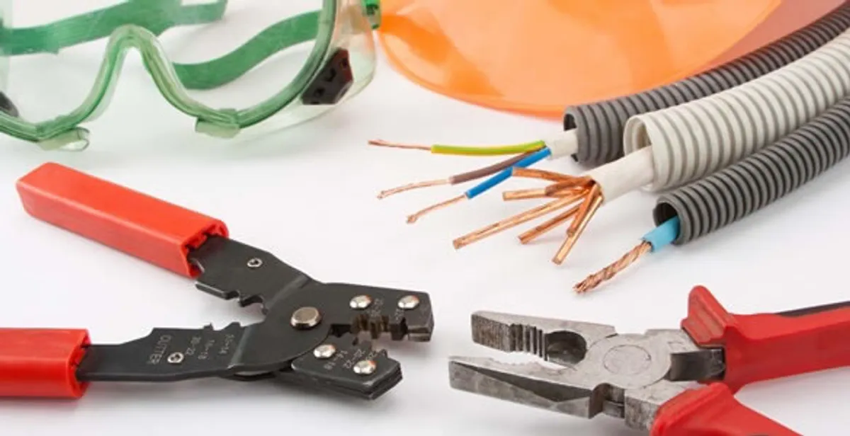 Electrical wiring repair with professional tools and safety equipment in Raisin City, CA