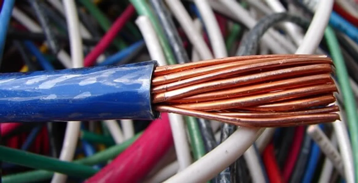 electrical wiring services showing exposed copper conductors and cable preparation in Fresno, CA
