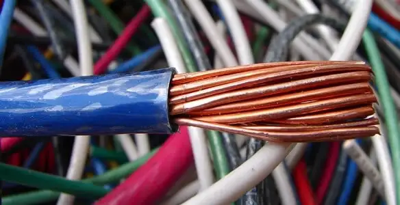 electrical wiring services showing exposed copper conductors and cable preparation in Fresno, CA