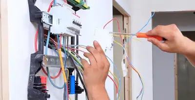 electrician services performing residential electrical panel wiring in Fresno, CA
