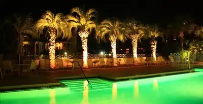 landscape lighting installation services illuminating outdoor recreational areas in Fresno, CA