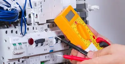 Residential electrician testing home electrical panel for safety and performance in Fresno, CA