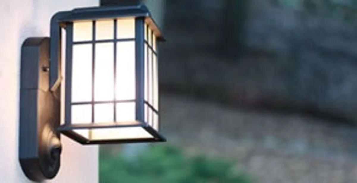 security light installation services with professionally mounted exterior wall light in Fresno, CA