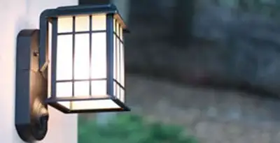 security light installation services with professionally mounted exterior wall light in Fresno, CA