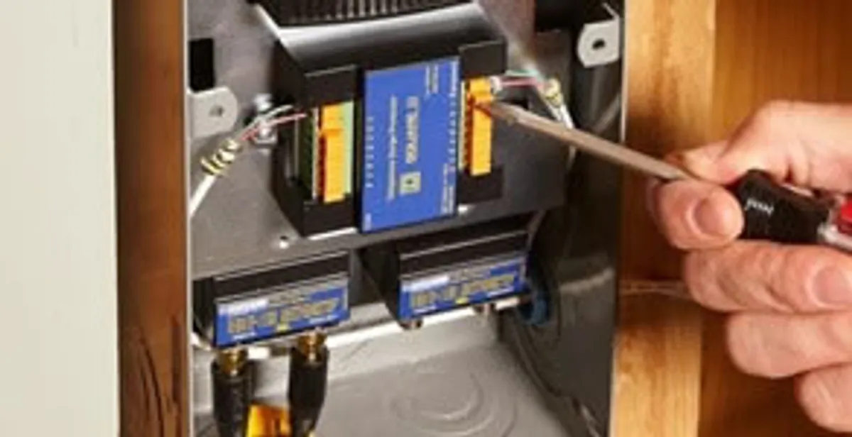 Whole home surge protection device being installed by a licensed electrician to protect electrical systems in Fresno, CA