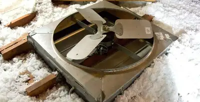 whole house fan installation services with attic-mounted ventilation unit in Fresno, CA