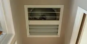 whole house fan installation services with ceiling-mounted ventilation system in Fresno, CA